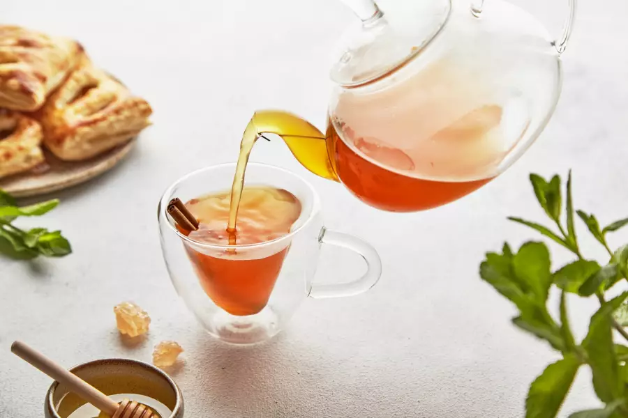 Готовое блюдо апельсиновый чай с гвоздикой и корицей