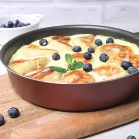 Сырники в сметанном соусе