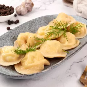 Пельмени с яйцом и капустой